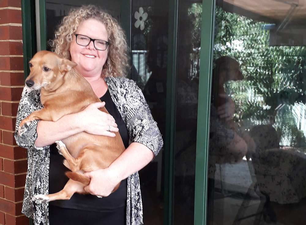Jacquie and her dog both love the sliding door repair work